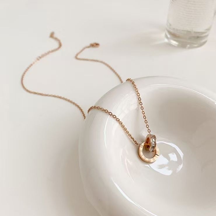 Set Perhiasan Titanium Desain Angka Romawi dipadukan dengan Permata Zirkon - Gambar 14